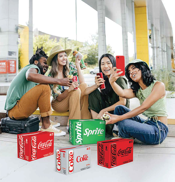 young adults enjoying each others company, laughing, taking selfies and drinking Coca-Cola